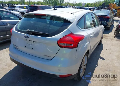 2018 Ford Focus Titanium z USA, uszkodzony, nr VIN 1FADP3N24JL279449